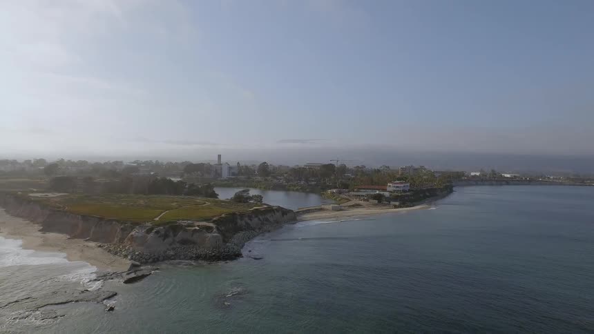 View of buildings next to a coastline