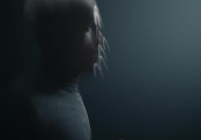 Man with lightcolored hairrunning outdoors at night