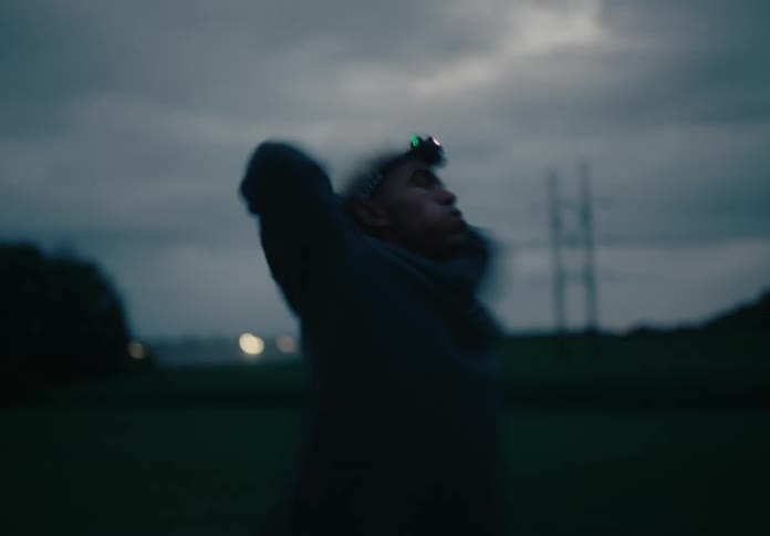 A man is running on the road takes a rest