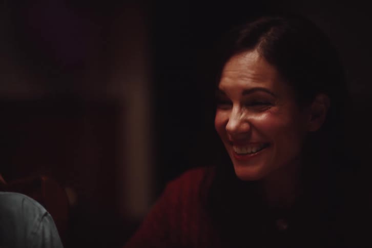 Mother happily celebrates her sons birthday