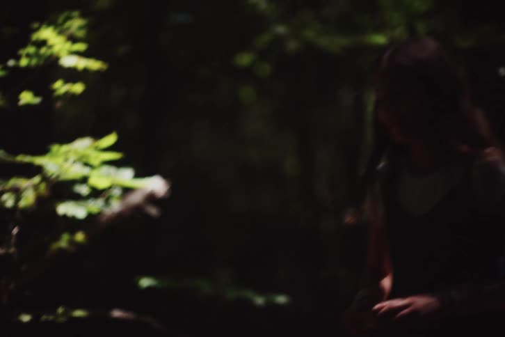Girl helping a boy to get up and ends up playing and letting go of his hand making him fall again