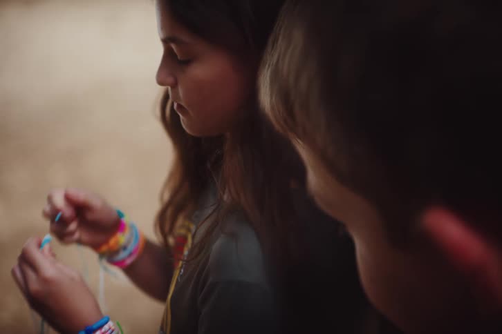 A clip of a girl and a boy playing