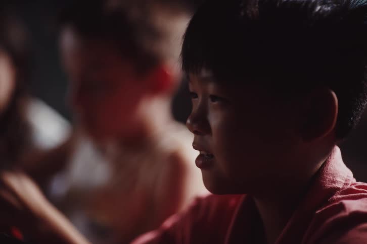 A clip of a young asian kid