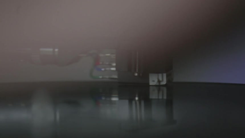 Person putting a needle on the record player
