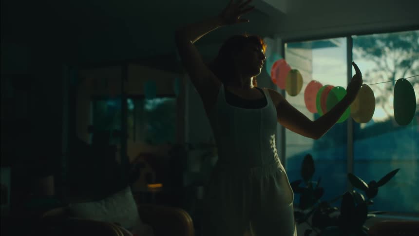 Woman dancing in a room