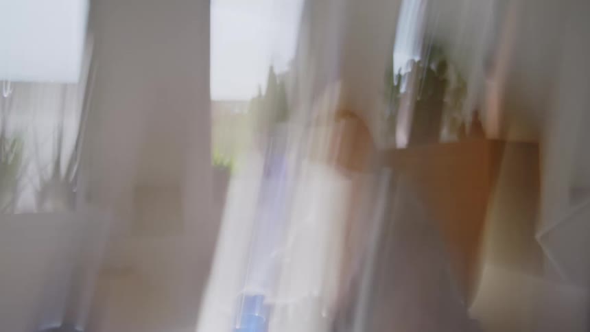 A woman is sitting and thinking at the desk in fast motion