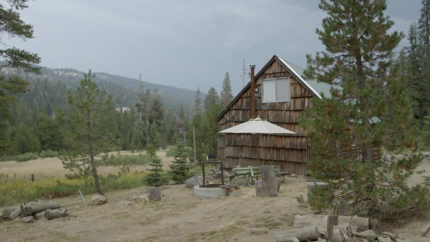 Small building sitting in the wilderness