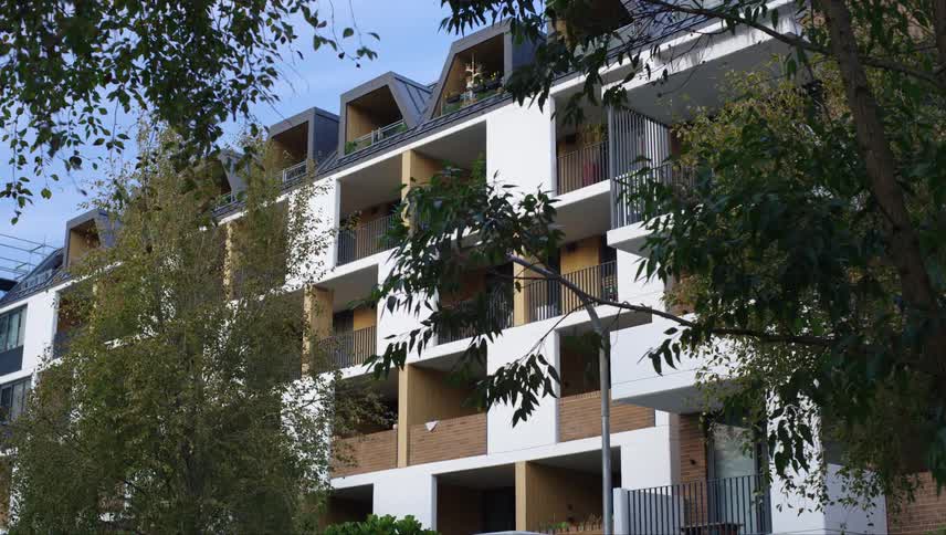 Modern residential building of various floors with spacious balconies