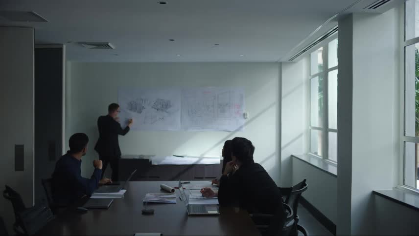 A clip of people having a meeting in an office