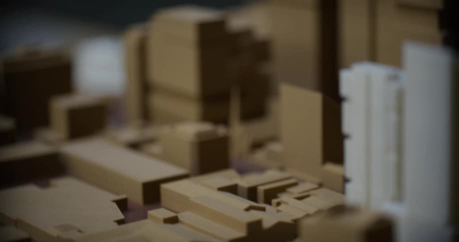 Architectural model of an urban area consisting of several buildings of different sizes and shapes