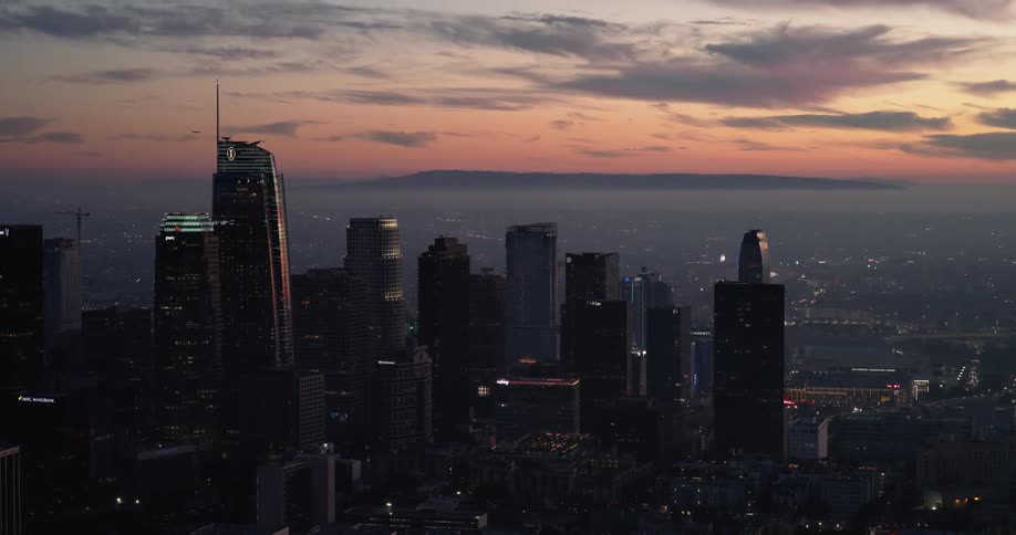 Aerial of a metropolis at sunset