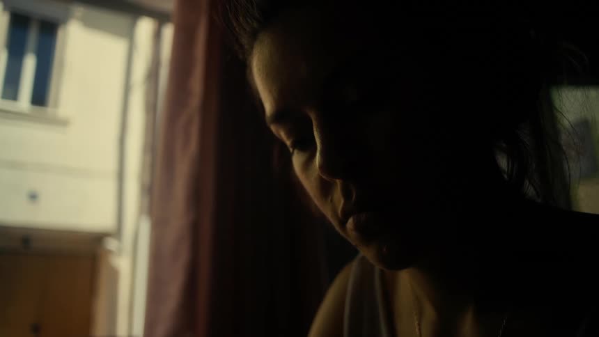 Portrait of a woman in a concentrated room