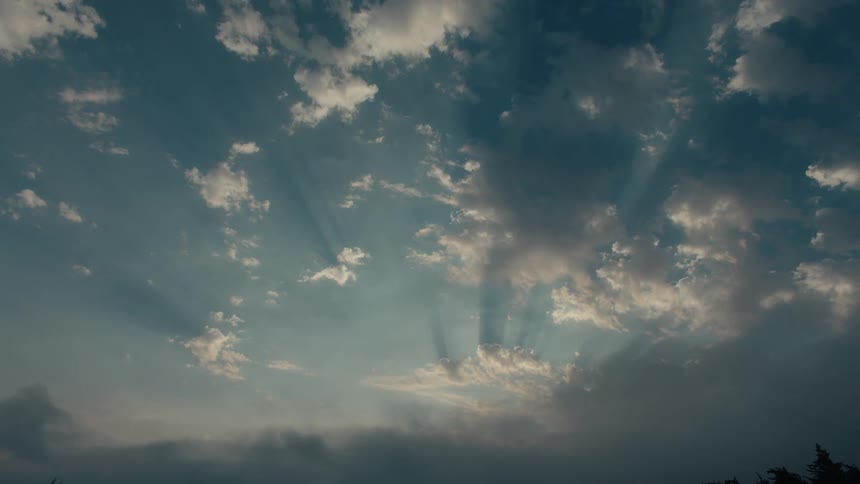 View of a sky with clouds and reflection of the sun