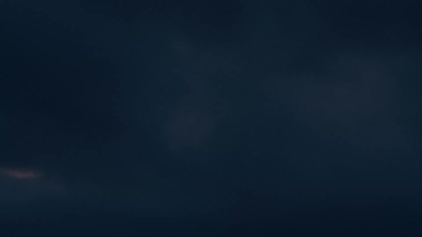 A dark cloudy sky at twilight