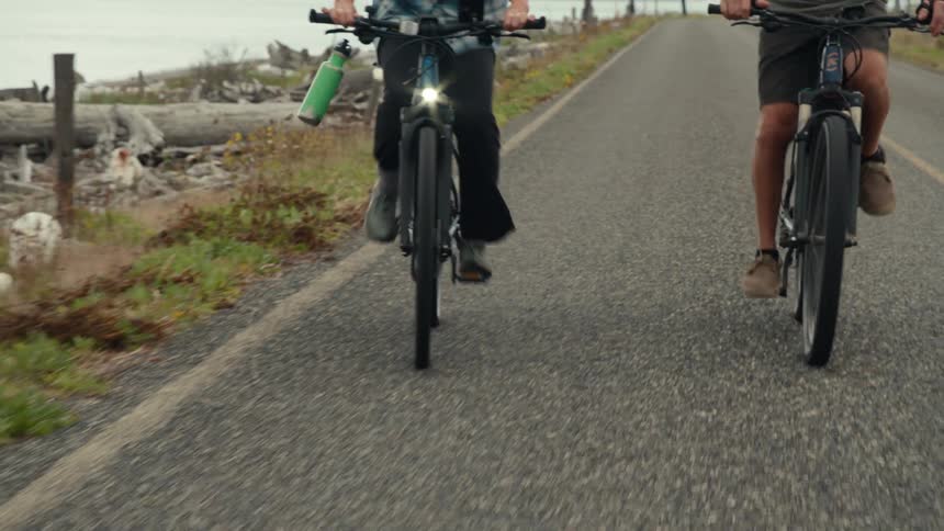 An image of two people cycling