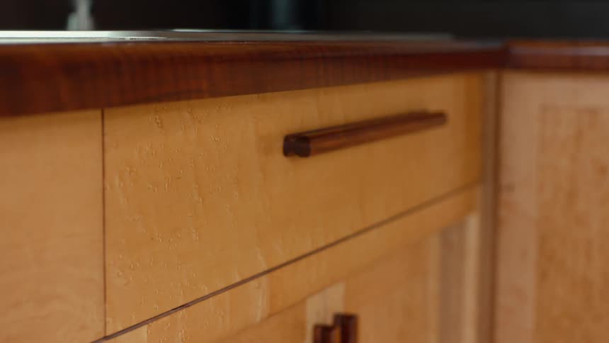 A handle is on the drawer