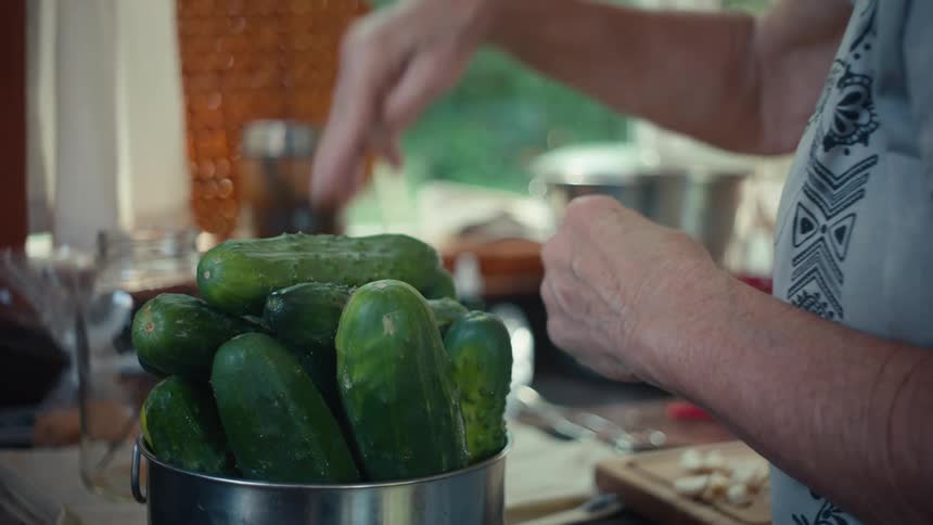 A close up clip of a person in the kitchen