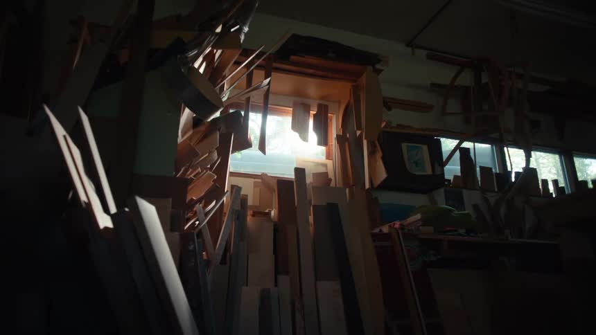 Sunlight filtering through a window with wooden slats