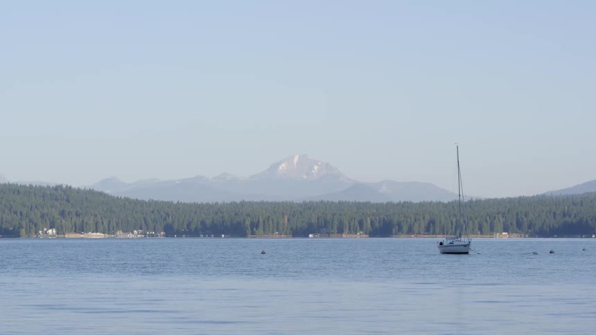 A boat is still in the water ahead