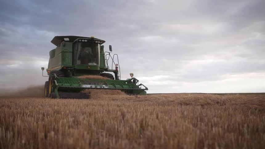 A clip of a tractor making an havest