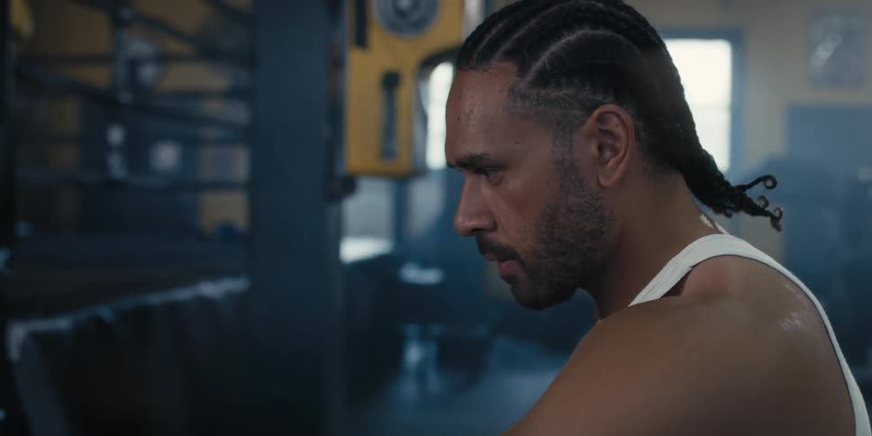 Side portrait of a focused boxer