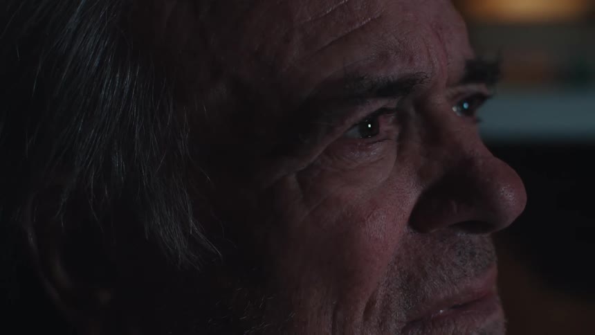 Portrait of a concentrated elderly man