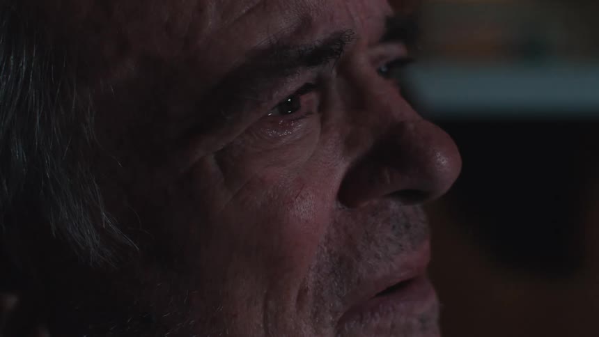 Portrait of an elderly man crying