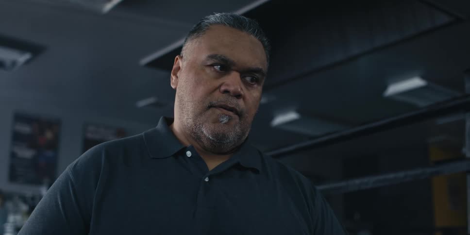 Portrait of a man in an indoor gym space