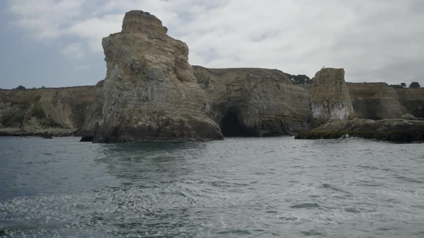The cliffs are lined with rough waters