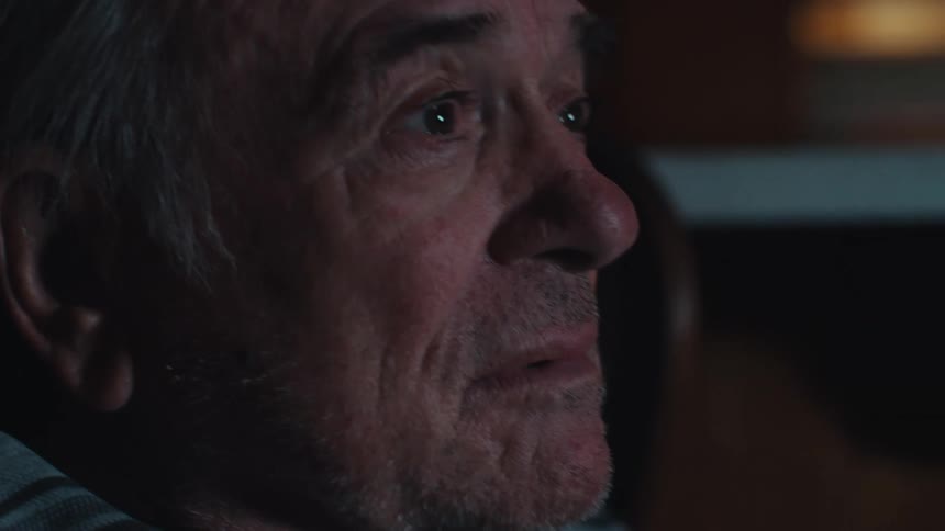 Man becomes emotional while watching a show at home
