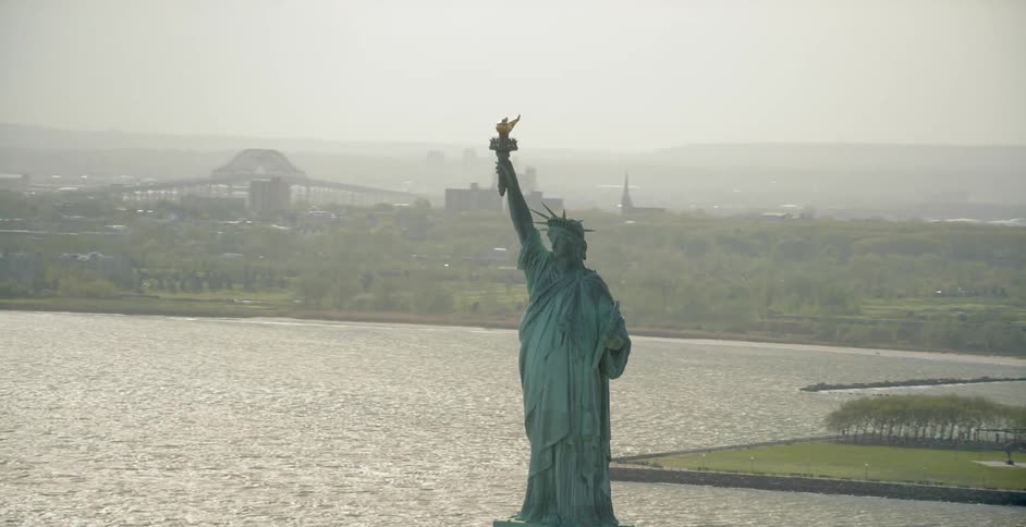 The statue of liberty on a foggy day