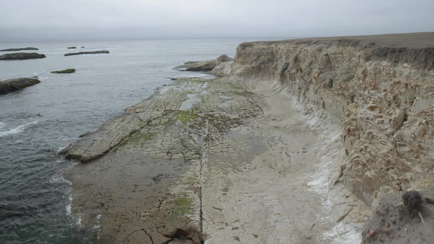 A sandy coastline in the daytime
