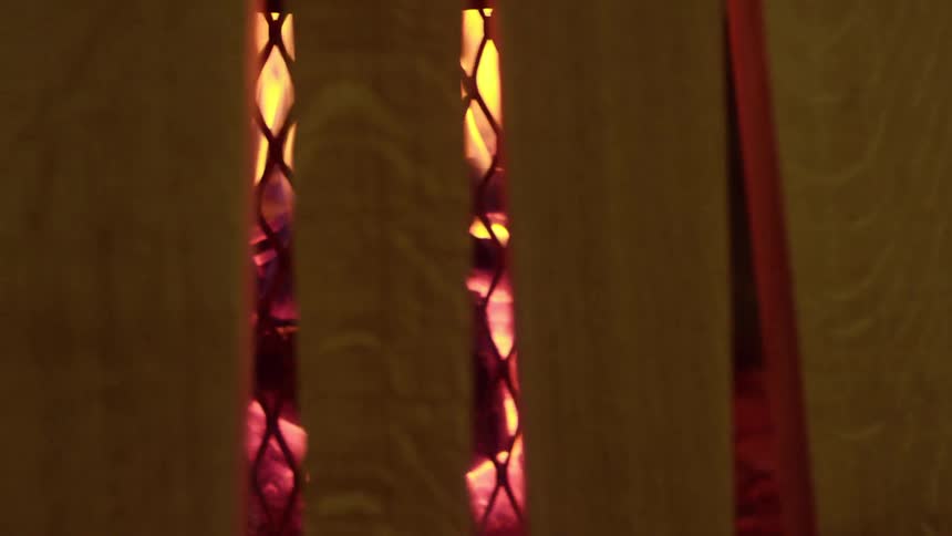 Bonfire surrounded by wooden pegs