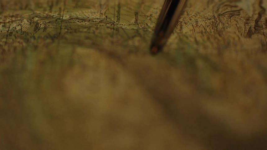 An image of a person reading a map