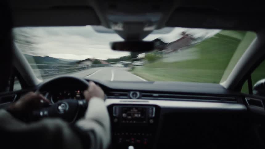 A clip of a person driving a car