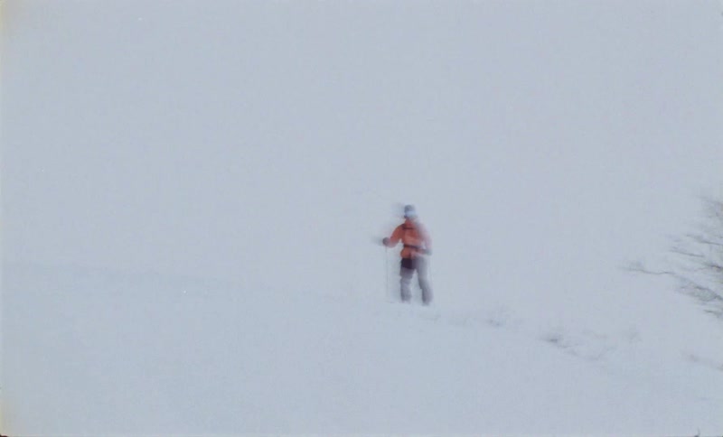 A clip of an hiker out in the ice mountain