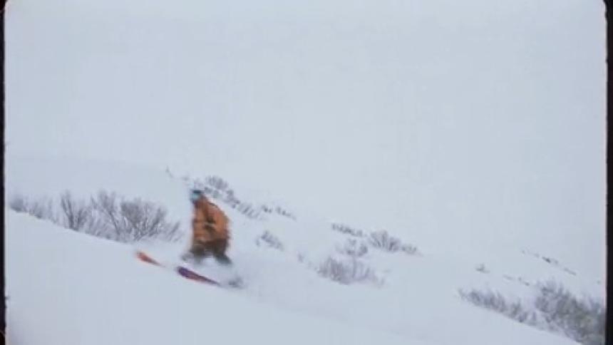 Person skiing on a snow covered mountain