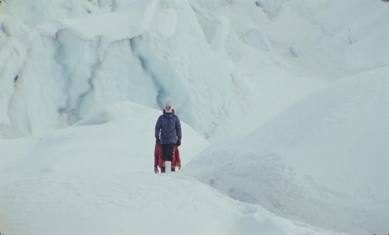 A clip of people hiking the arctic mountain