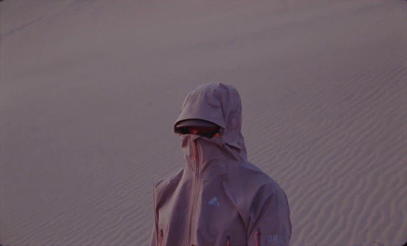 A clip of a person standing in the desert