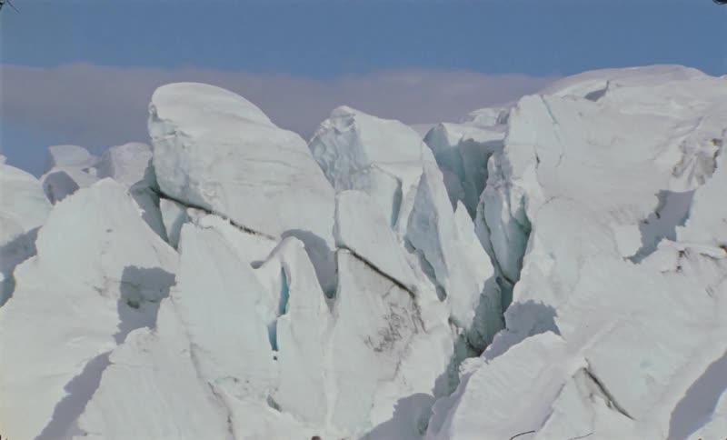 A large wall of ice has a crack