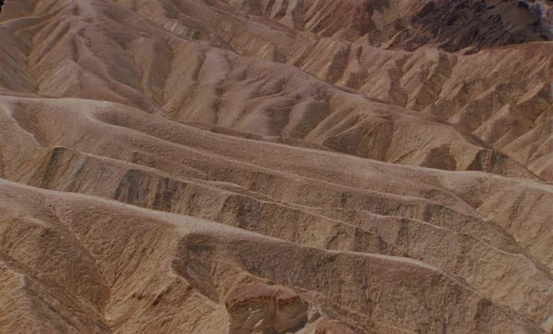 Landscape of a desert mountain valley with erosion