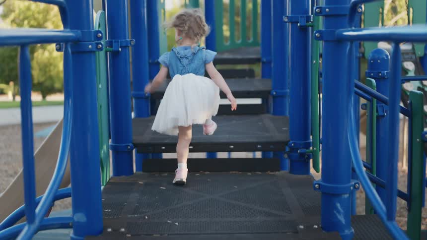 A clip of a young female kid playing