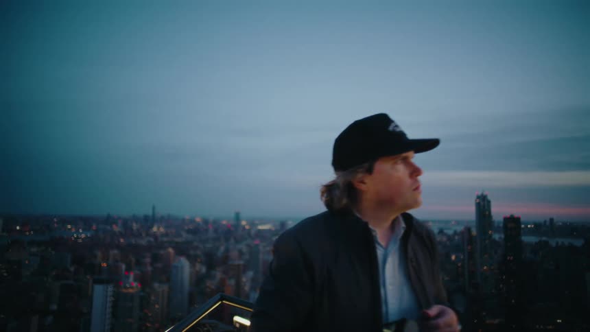 A clip of a person handling a camera