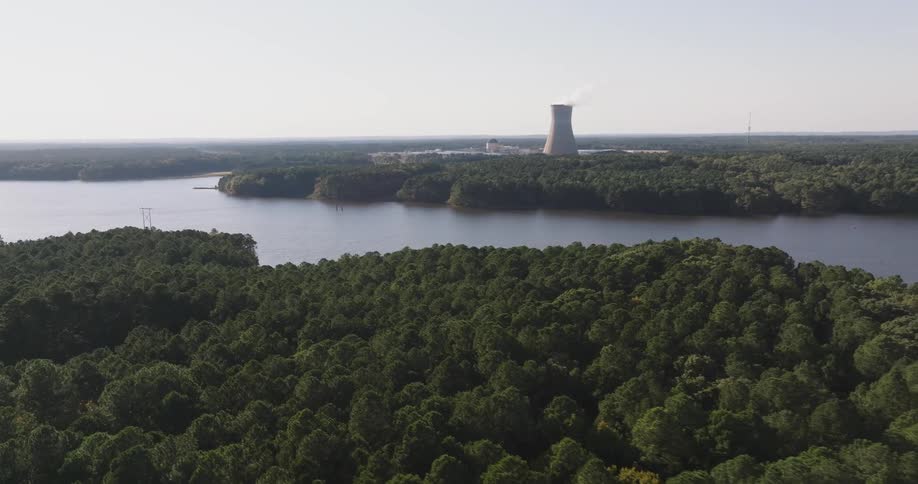 An aerial clip of an industry beside a river