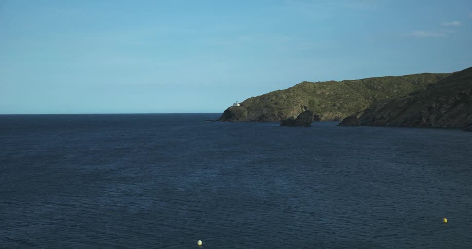 Aerial panorama of the sea with the mountainous coast in the background