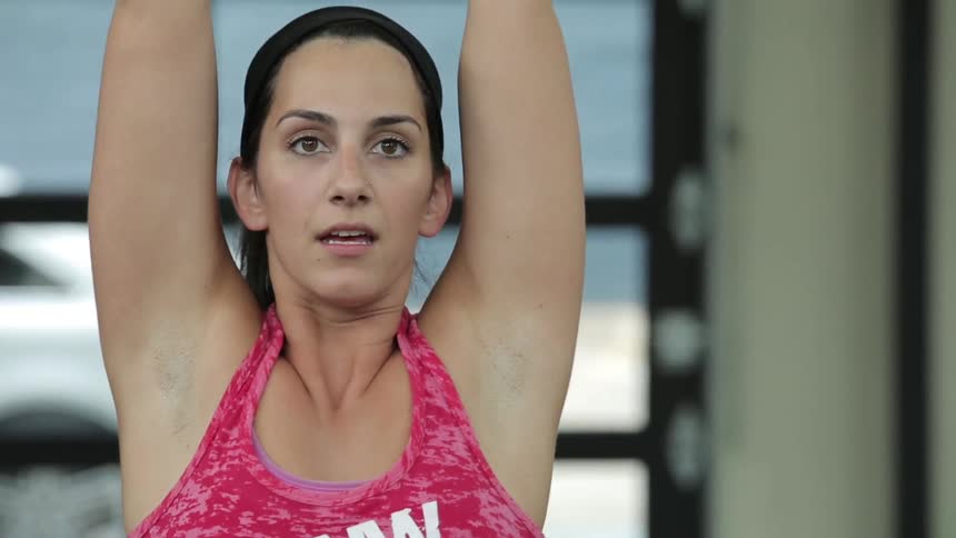 Woman swinging kettlebell