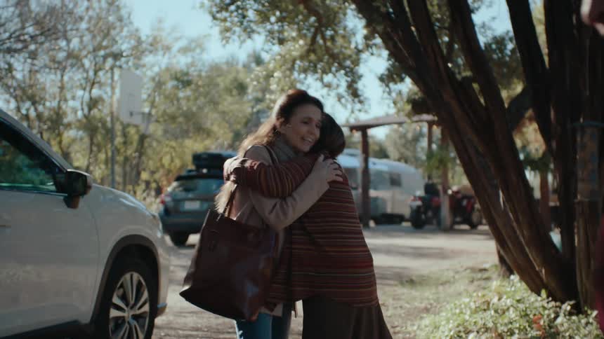 A clip of elderly people embracing each other