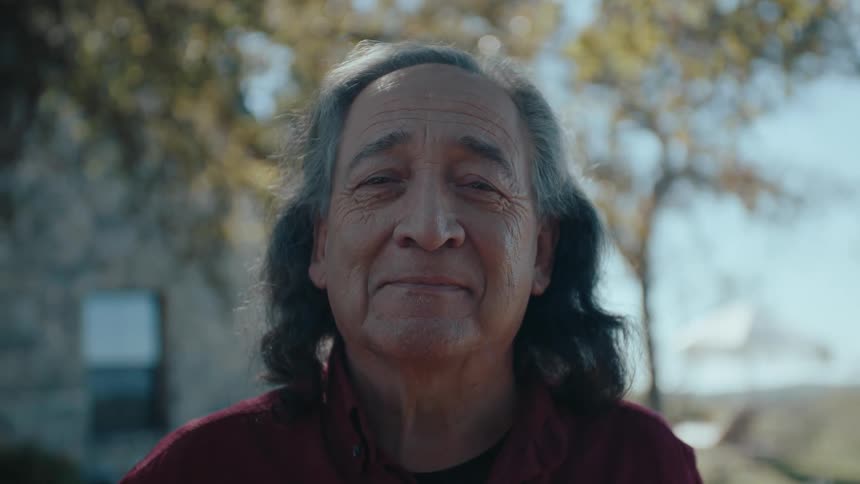 Portrait of a happy elderly man in an outdoor area