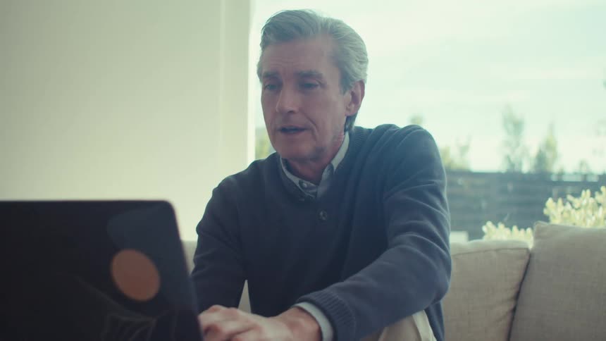 A clip of a person operating a laptop