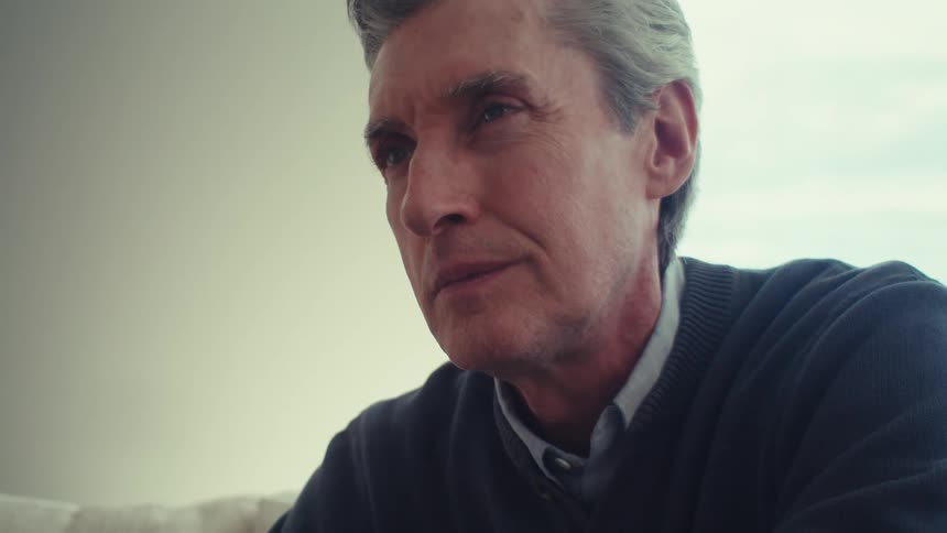 Portrait of a man sitting on the sofa